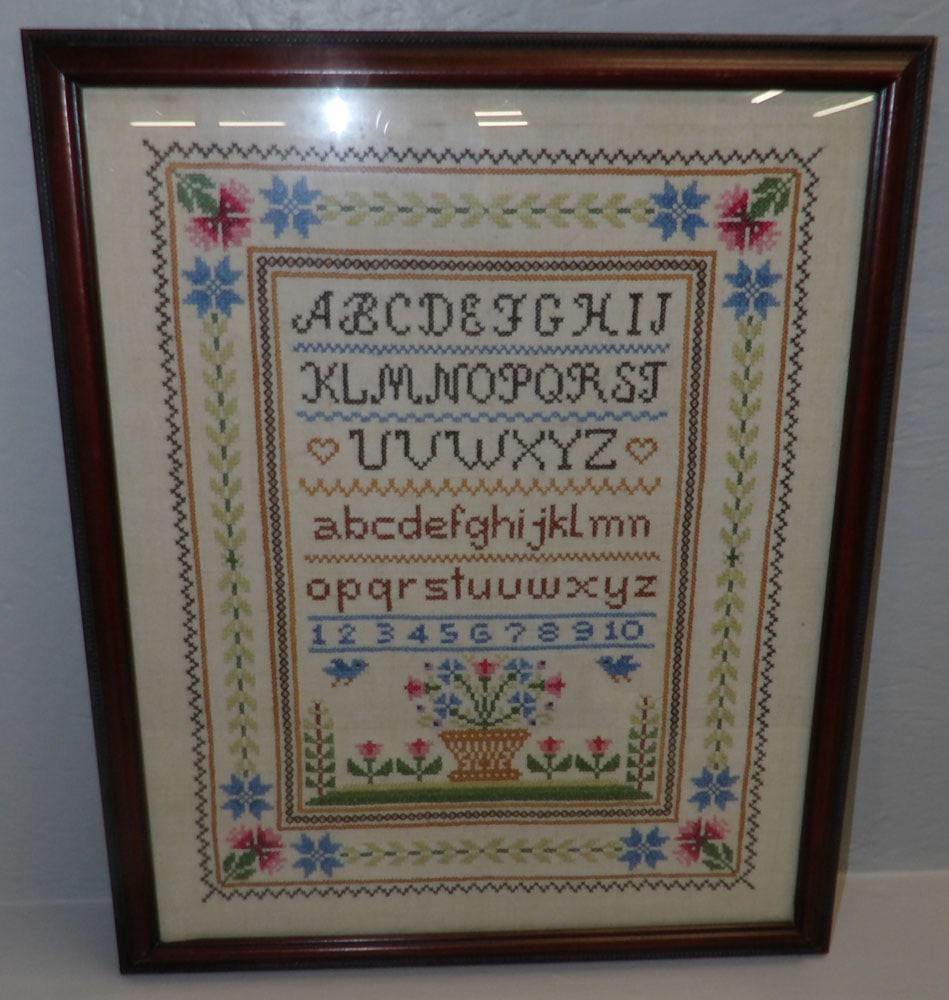 framed needlework sampler: framed needlework sampler. 17 3/4" x 21 3/4" "ALL DESCRIPTIONS AND ANY CONDITION STATEMENT GIVEN BY LANGSTON AUCTION GALLERY ARE STRICTLY OPINIONS AND LANGSTON'S SHALL HAVE NO RESPONSIBILITY FOR ERROR