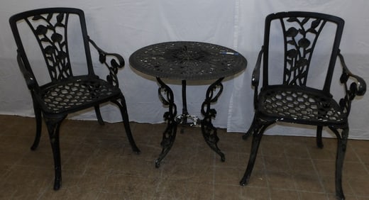 3 pieces of painted metal outdoor table and chairs
