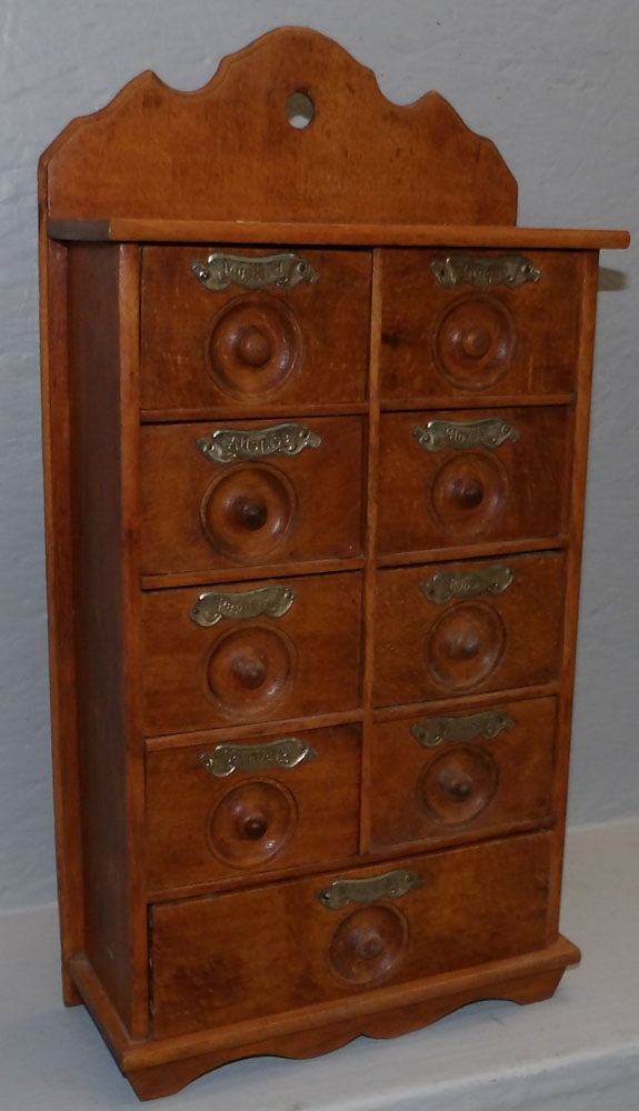 maple spice cabinet: maple spice cabinet . 9 3/4" W 19" H "ALL DESCRIPTIONS AND ANY CONDITION STATEMENT GIVEN BY LANGSTON AUCTION GALLERY ARE STRICTLY OPINIONS AND LANGSTON'S SHALL HAVE NO RESPONSIBILITY FOR ERRORS OR OMI