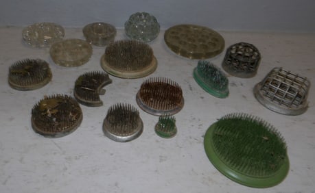 lot of metal and glass flower frogs