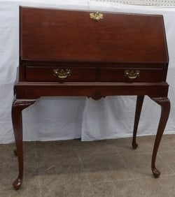 cherry Queen Anne style slat front desk by Jasper cabinet company