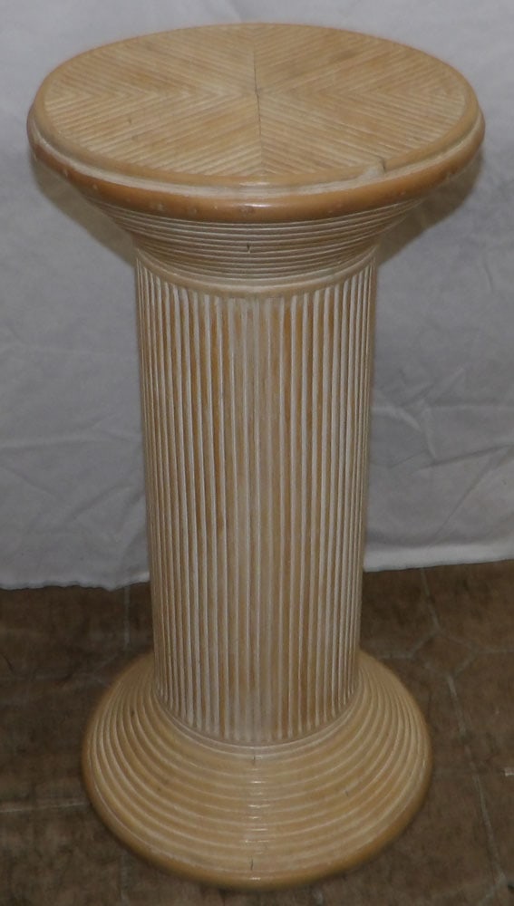 painted rattan pedestal: painted rattan pedestal. 12" Dia. 24 1/4" H "ALL DESCRIPTIONS AND ANY CONDITION STATEMENT GIVEN BY LANGSTON AUCTION GALLERY ARE STRICTLY OPINIONS AND LANGSTON'S SHALL HAVE NO RESPONSIBILITY FOR ERRORS