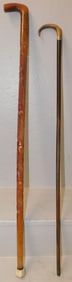carved wood walking stick and rosewood horn handle walking stick