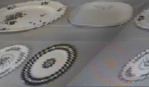 two painted porcelain platters and two chargers