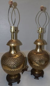 pair of brass open work urn lamps