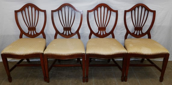 set of four mahogany shield back dining chairs