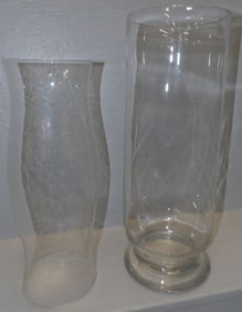large glass vase and hurricane shade