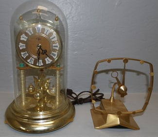 brass anniversary clock and gilded metal electric clock