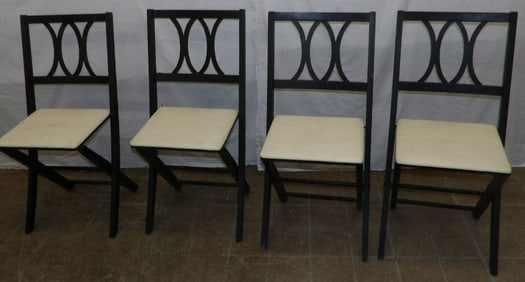 four painted wood folding chairs