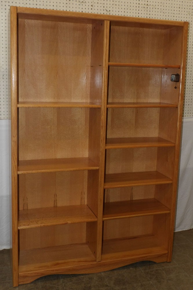 oak bookshelf: oak bookshelf. 48" W 12 3/4" D 72 1/4" H "ALL DESCRIPTIONS AND ANY CONDITION STATEMENT GIVEN BY LANGSTON AUCTION GALLERY ARE STRICTLY OPINIONS AND LANGSTON'S SHALL HAVE NO RESPONSIBILITY FOR ERRORS OR