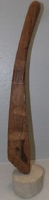 carved wood sculpture on marble base