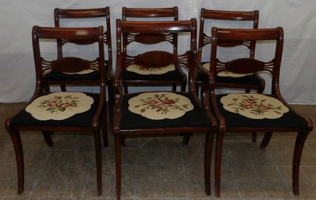 set of 6 mahogany dining chairs with needlepoint seats