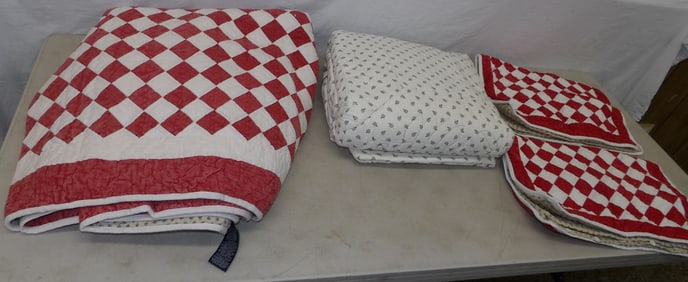 lot of vintage quilts