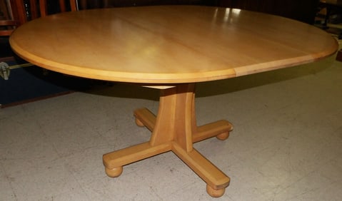 maple oval dining table with one leaf by Ethan Allen
