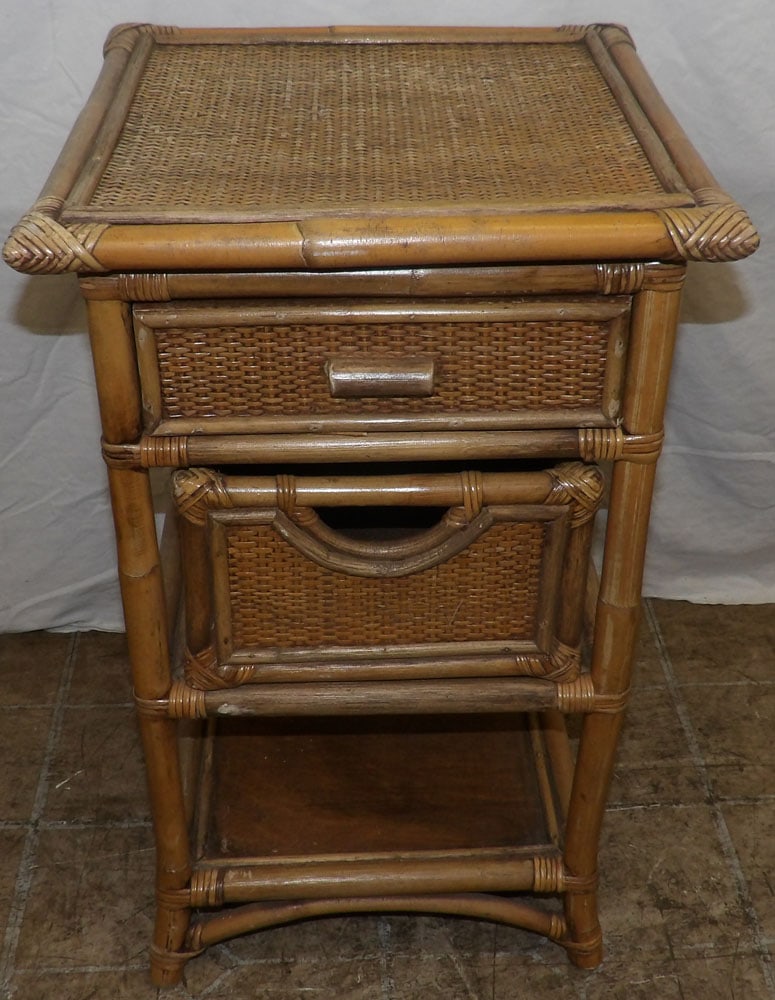 rattan stand: rattan stand . 15 1/2" Dia. 25 1/2" "ALL DESCRIPTIONS AND ANY CONDITION STATEMENT GIVEN BY LANGSTON AUCTION GALLERY ARE STRICTLY OPINIONS AND LANGSTON'S SHALL HAVE NO RESPONSIBILITY FOR ERRORS OR OMIS