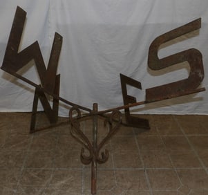 metal weathervane and wall hanging bird bath
