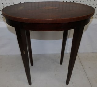 mahogany inlaid stand by Baker