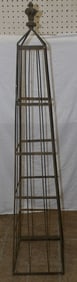 metal stand in obelisk form
