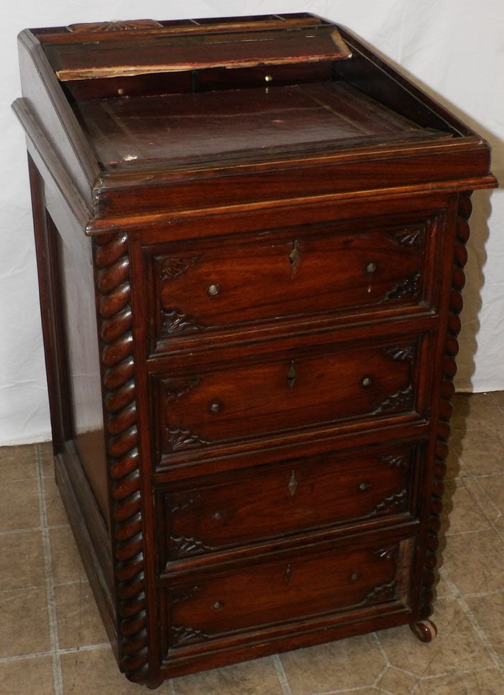 antique rosewood Davenport desk: antique rosewood Davenport desk. 19 1/4" W 22 1/4" D 31 1/2" H "ALL DESCRIPTIONS AND ANY CONDITION STATEMENT GIVEN BY LANGSTON AUCTION GALLERY ARE STRICTLY OPINIONS AND LANGSTON'S SHALL HAVE NO RESPON