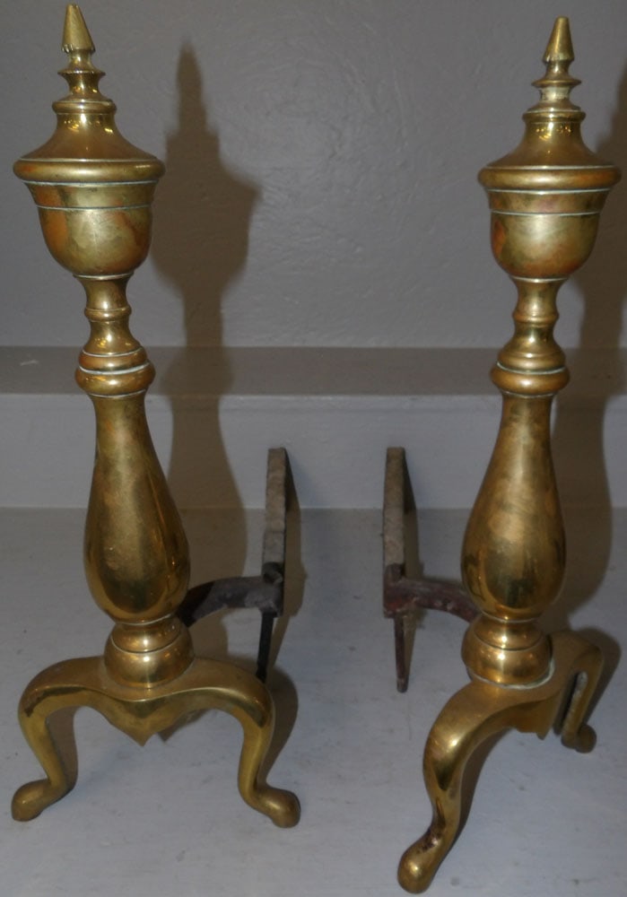 pair of brass andirons: pair of brass andirons . 19 1/4" H "ALL DESCRIPTIONS AND ANY CONDITION STATEMENT GIVEN BY LANGSTON AUCTION GALLERY ARE STRICTLY OPINIONS AND LANGSTON'S SHALL HAVE NO RESPONSIBILITY FOR ERRORS OR OMISS