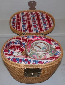 oriental porcelain teapot in basket