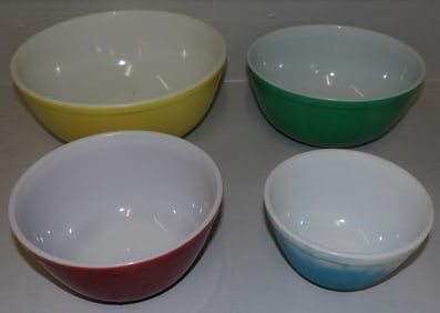 four vintage Pyrex mixing bowls