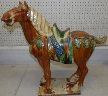 Painted Pottery Chinese Horse Statue: Painted Pottery Chinese Horse Statue. 27" L 27 1/4" H "ALL DESCRIPTIONS AND ANY CONDITION STATEMENT GIVEN BY LANGSTON AUCTION GALLERY ARE STRICTLY OPINIONS AND LANGSTON'S SHALL HAVE NO RESPONSIBILITY