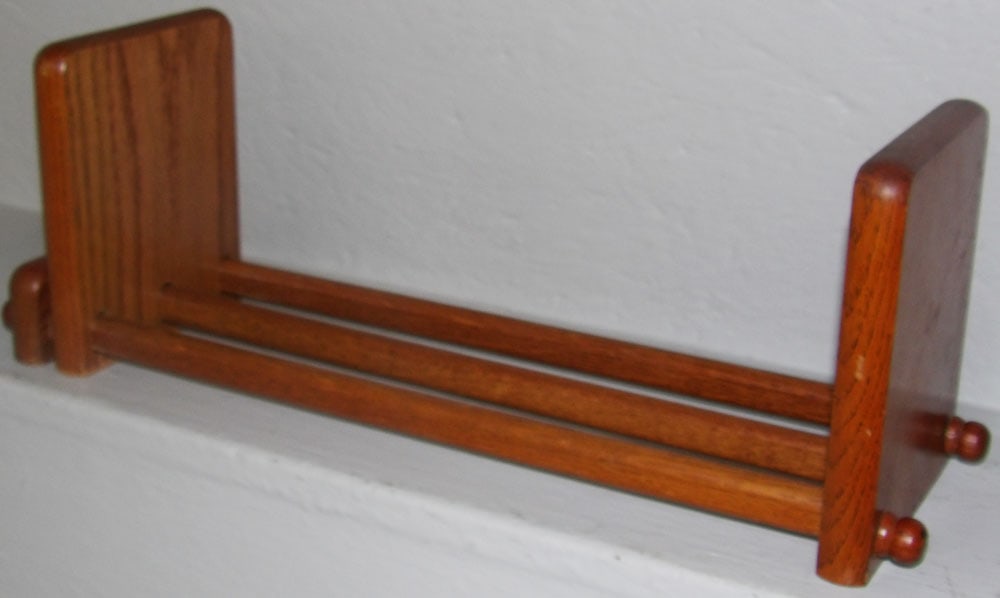 Mid Century Modern Oak Adjustable Book Holder: Mid Century Modern Oak Adjustable Book Holder. "ALL DESCRIPTIONS AND ANY CONDITION STATEMENT GIVEN BY LANGSTON AUCTION GALLERY ARE STRICTLY OPINIONS AND LANGSTON'S SHALL HAVE NO RESPONSIBILITY FOR ERR