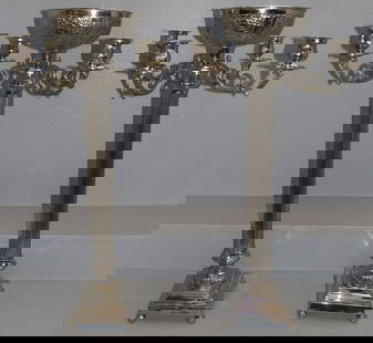 Pair of Tall Silver Plated Four Light Buffet Candelabras: Pair of Tall Silver Plated Four Light Buffet Candelabras. 33" H "ALL DESCRIPTIONS AND ANY CONDITION STATEMENT GIVEN BY LANGSTON AUCTION GALLERY ARE STRICTLY OPINIONS AND LANGSTON'S SHALL HAVE NO RESPO