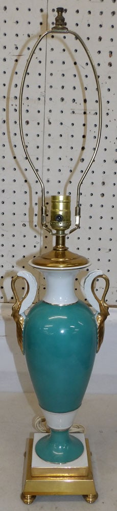 Painted Porcelain Urn with Swan Handles Made Into Lamp: Painted Porcelain Urn with Swan Handles Made Into Lamp. 31" H "ALL DESCRIPTIONS AND ANY CONDITION STATEMENT GIVEN BY LANGSTON AUCTION GALLERY ARE STRICTLY OPINIONS AND LANGSTON'S SHALL HAVE NO RESPONS