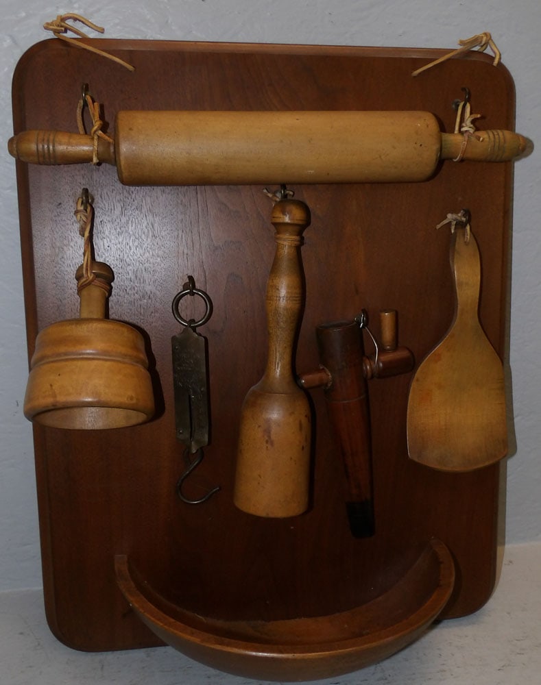 Collection of Primitive Kitchen Items on Walnut Panel (1 of 4)