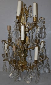 brass and crystal wall sconce