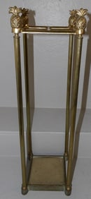 brass umbrella stand with pineapple finials