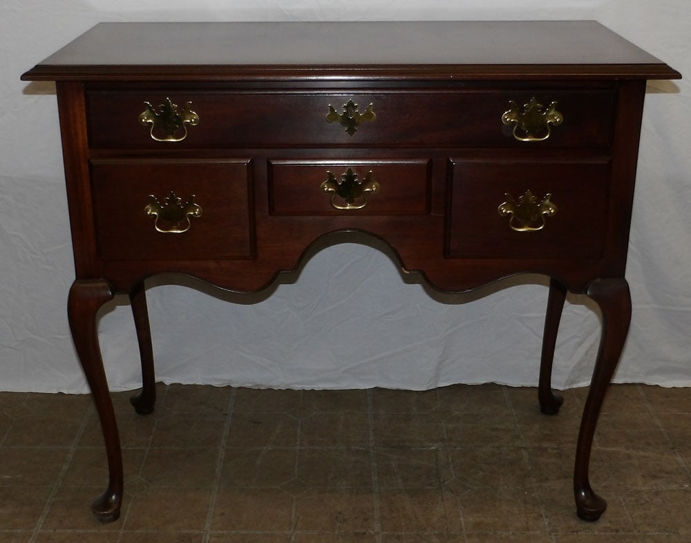 Mahogany Queen Anne Lowboy by Hickory Chair Company, (Historical James River Plantation): Mahogany Queen Anne Lowboy by Hickory Chair Company, (Historical James River Plantation). 39" W 20" D 32 1/2" H "ALL DESCRIPTIONS AND ANY CONDITION STATEMENT GIVEN BY LANGSTON AUCTION GALLERY ARE STRI