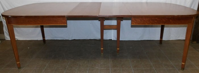 mahogany inlaid dining table with two leaves
