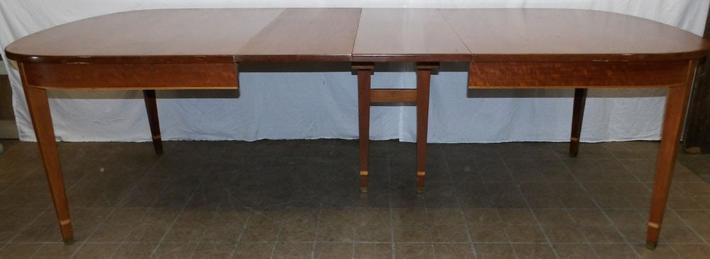mahogany inlaid dining table with two leaves: mahogany inlaid dining table with two leaves . 102 1/2" W 48" D 30 1/4" H "ALL DESCRIPTIONS AND ANY CONDITION STATEMENT GIVEN BY LANGSTON AUCTION GALLERY ARE STRICTLY OPINIONS AND LANGSTON'S SHALL HAV