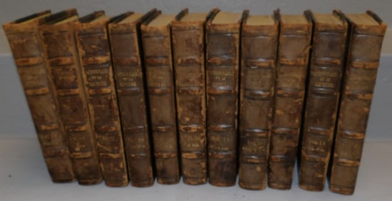 11 volumes of leather bound French books, dated 1837