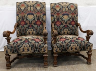 pair of carved walnut and tapestry upholstered arm chairs