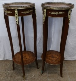 pair of mahogany inlaid French stands with brass gallery
