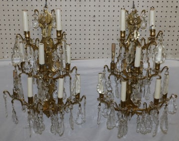 pair of brass and crystal 9 light sconces