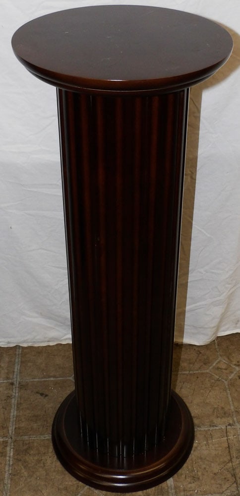 cherry fluted pedestal: cherry fluted pedestal. 11 1/4" Dia. 31 3/4" H "ALL DESCRIPTIONS AND ANY CONDITION STATEMENT GIVEN BY LANGSTON AUCTION GALLERY ARE STRICTLY OPINIONS AND LANGSTON'S SHALL HAVE NO RESPONSIBILITY FOR ERR