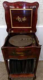 Antique mahogany & painted case Regina music box with 44 disks