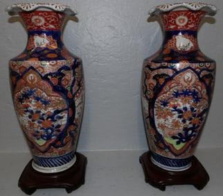 pair of 19th century Imari porcelain vases on teakwood stand