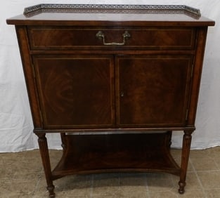 mahogany cabinet with bronze gallery