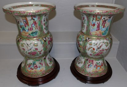 pair of 19th century rose medallion vases, (one with staple restoration)