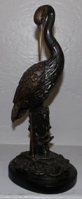bronze heron sculpture