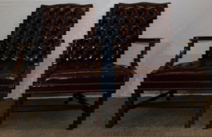 pair of cherry and leather upholstered Chesterfield style arm chairs by Hickory Chair company
