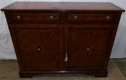 mahogany banded and brass inlay cabinet by Theodore Alexander