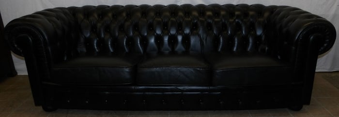 black leather upholstered Chesterfield style sofa