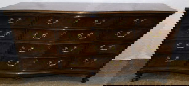 mahogany banded top twelve drawer dresser by Henry Dunn